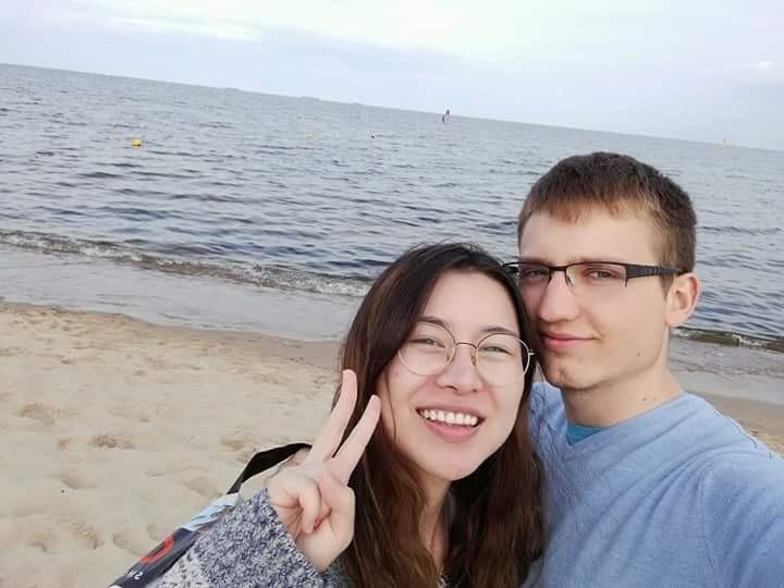Sharon and Tomasz on a beach